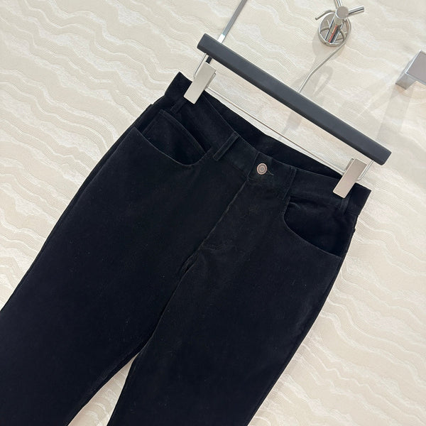 Pantaloni svasati in velluto Celine in cotone nero