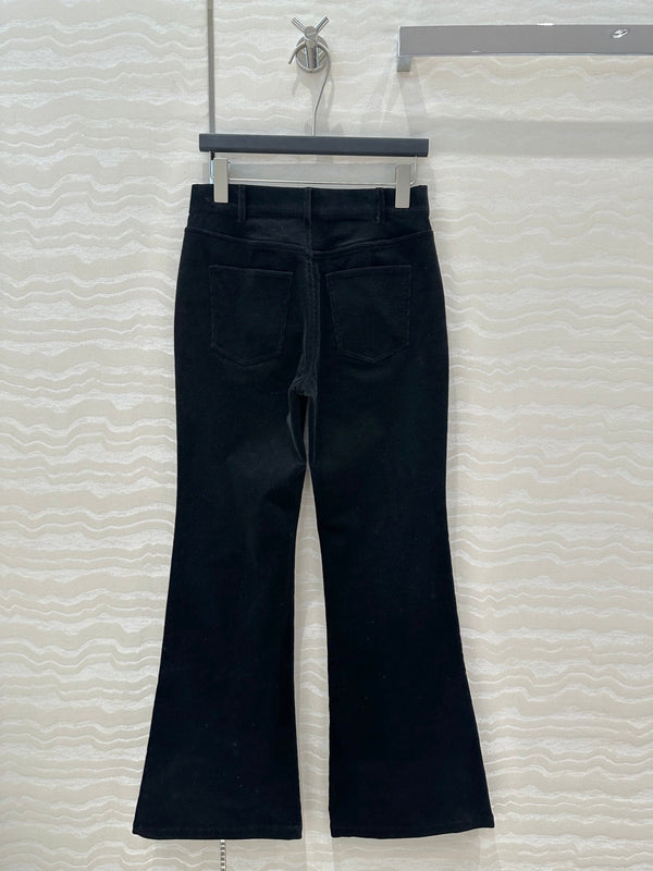 Pantaloni svasati in velluto Celine in cotone nero
