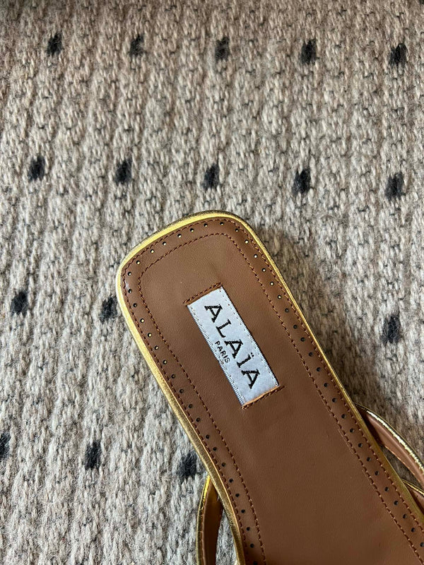Alaia 25 Infradito Fishnet Flat Mules Gold Lampskin 303709