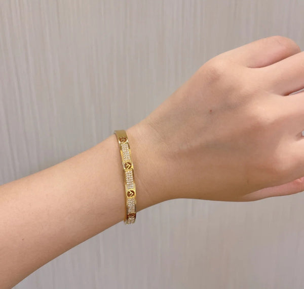 F BRACCIALE IN ORO ROSA CON DIAMANTI