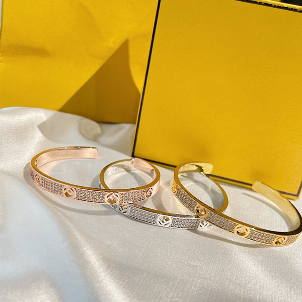 F BRACCIALE IN ORO ROSA CON DIAMANTI