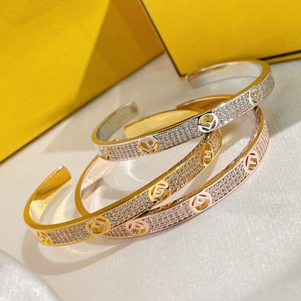 F BRACCIALE IN ORO ROSA CON DIAMANTI