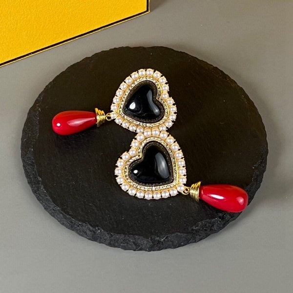 ORECCHINI IN ORO CON PERLA A CUORE F