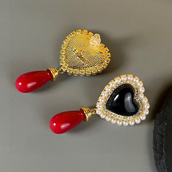 ORECCHINI IN ORO CON PERLA A CUORE F