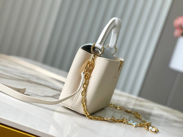 CAPUCINES MINI 21 CREAM CLOUD BLUE TAURILLON GOLD HARDWARE