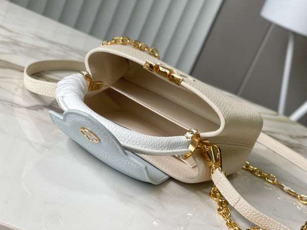 CAPUCINES MINI 21 CREAM CLOUD BLUE TAURILLON GOLD HARDWARE
