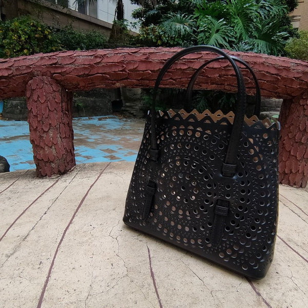 ALAIA MINA 20 BAG IN VIENNE WAVE CALFSKIN