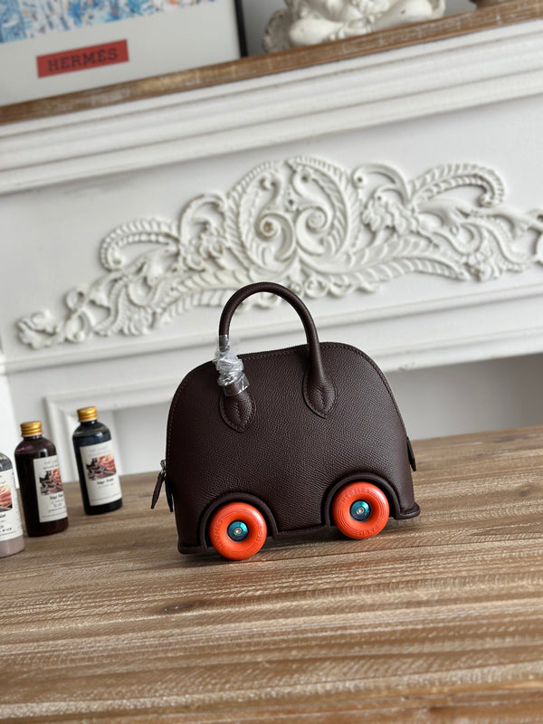HM Bolide Mini 19cm Burgundy Epsom Leather on Orange Wheels