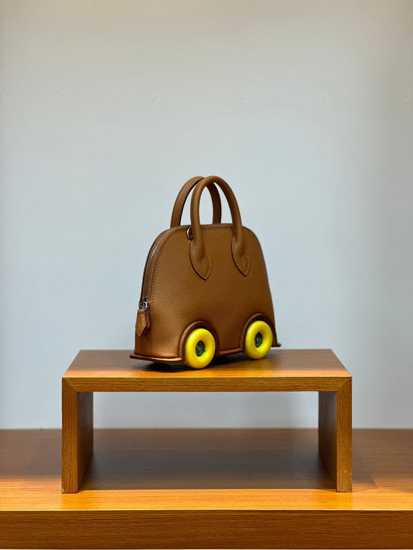 HM Bolide Mini 19cm in pelle Epsom dorata su cerchi gialli