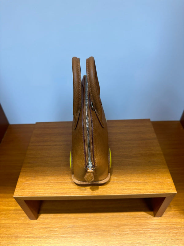 HM Bolide Mini 19cm in pelle Epsom dorata su cerchi gialli