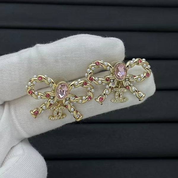 Boucles d'oreilles nœud en ruban CC Chanel
