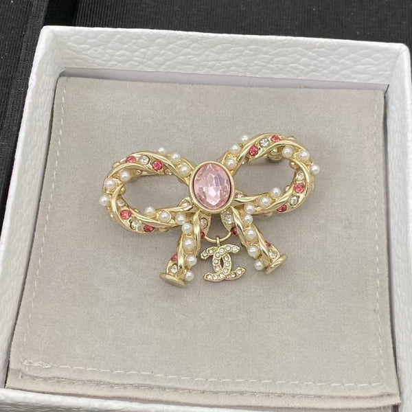 Boucles d'oreilles nœud en ruban CC Chanel
