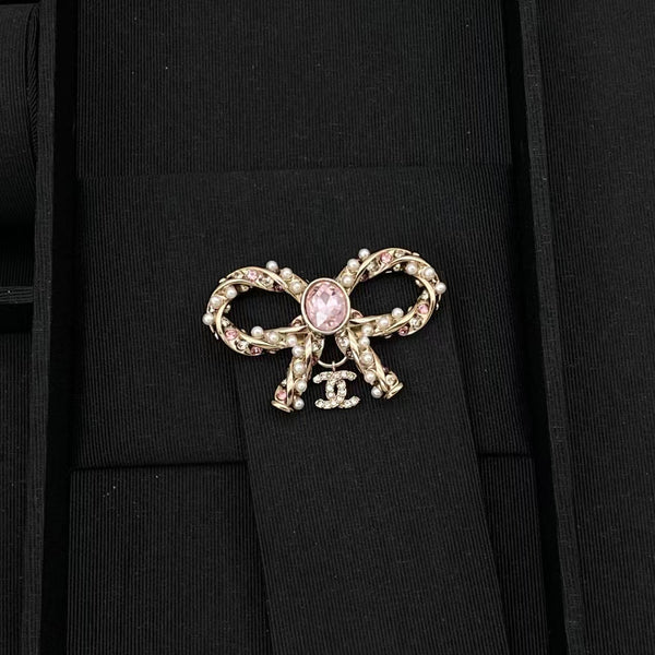 Boucles d'oreilles nœud en ruban CC Chanel