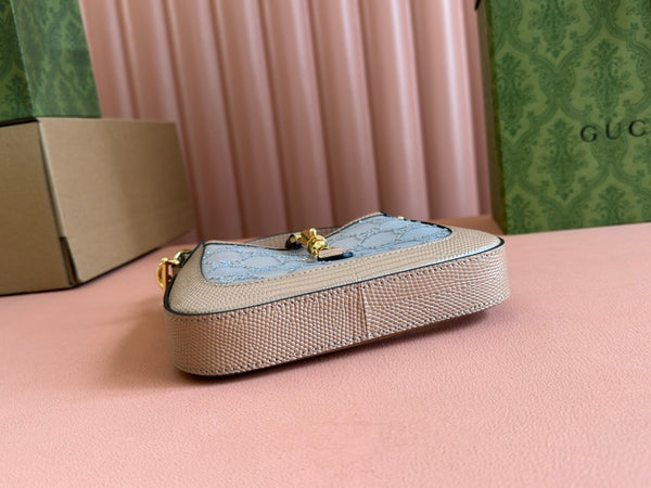 Sac GG Jackie Mini en cuir de lézard rose orné de cristaux 675799