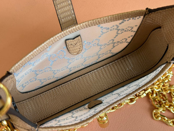 Sac GG Jackie Mini en cuir de lézard rose orné de cristaux 675799