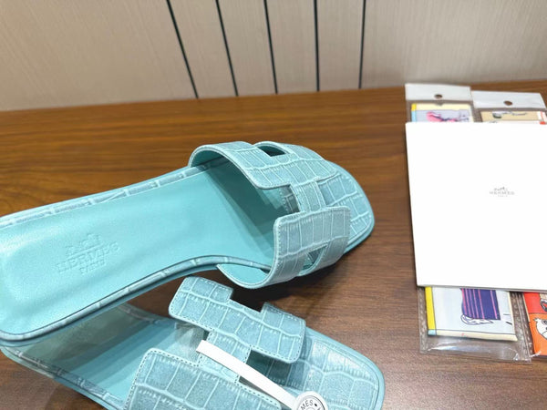 HM 26s Oran Slides Light Blue Crocodile-Embossed Leather