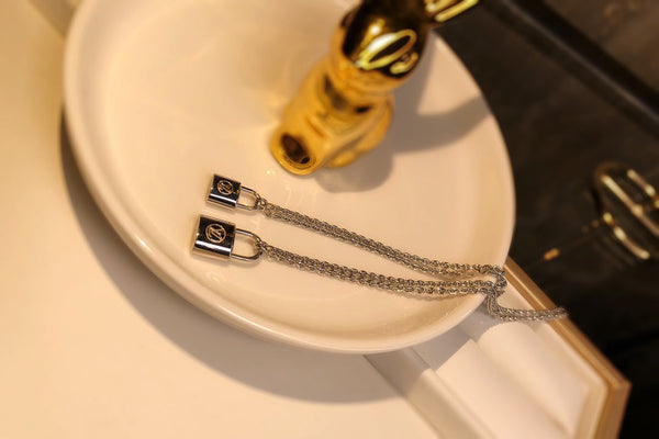 LV CHARITY LOCK NECKLACE