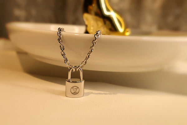 LV CHARITY LOCK NECKLACE