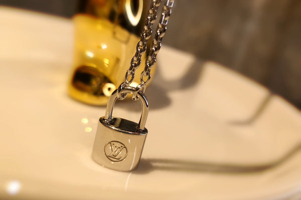 LV CHARITY LOCK NECKLACE