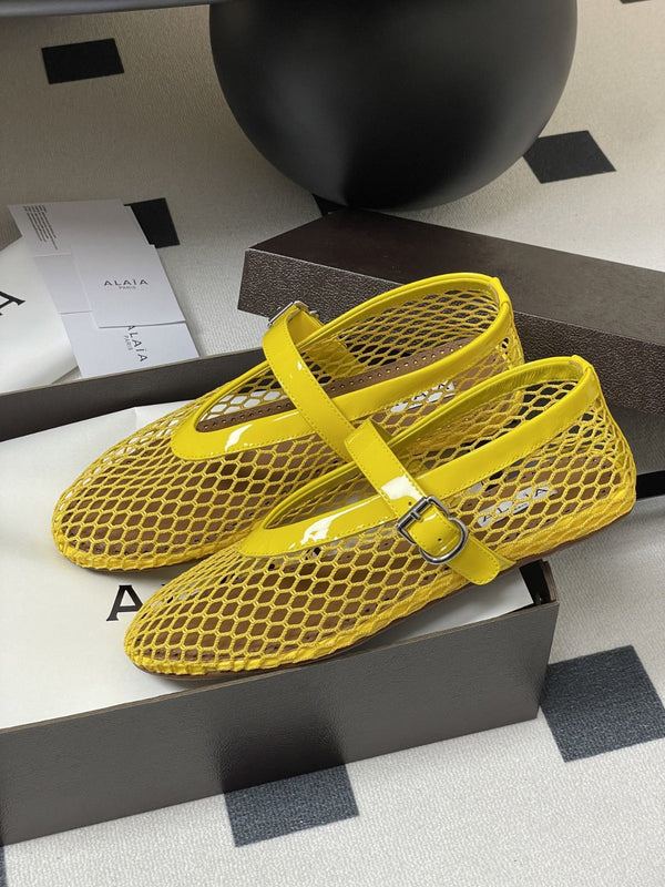 ALAIA BALLET FLATS IN YELLOW MESH FISHNET