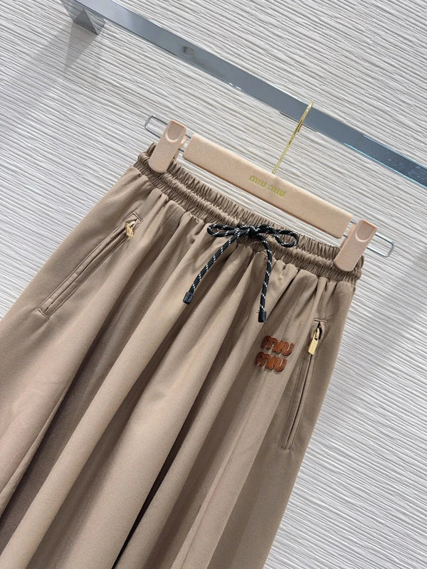 Jupe midi Miumiu 2026 en polyester noir et beige