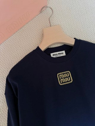 T-shirt a maniche lunghe Miu Miu in cotone