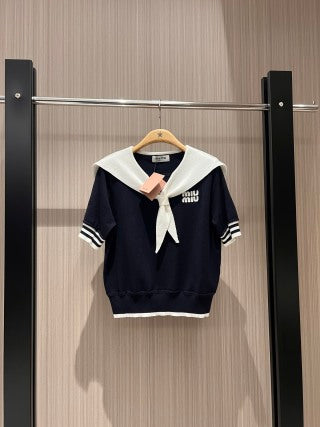 Maglia in maglia a maniche corte con colletto annodato Miu Miu, lana tencel