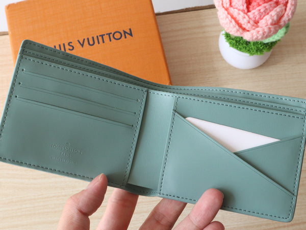 LV Multiple Wallet Monogram Grained Taurillon Cowhide