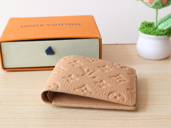 LV Multiple Wallet Monogram Grained Taurillon Cowhide