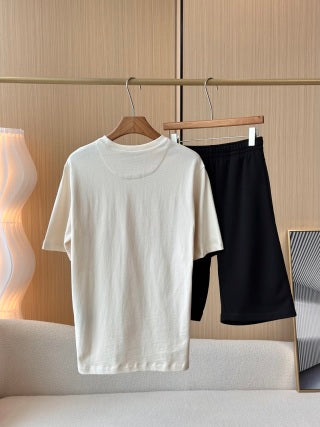 T-shirt girocollo con logo triangolare Prada in cotone beige