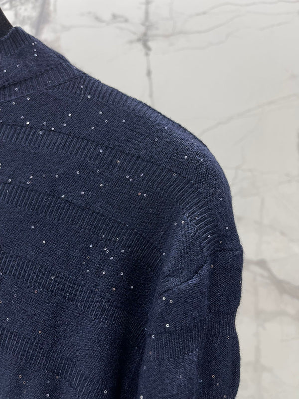 Pull col roulé en laine Chanel 2025