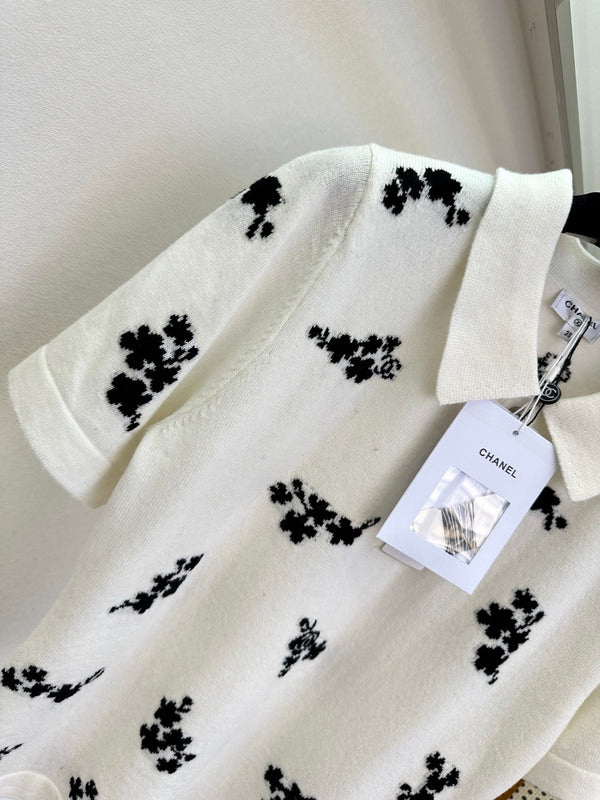 Polo Chanel 2026 en coton noir et blanc à imprimé floral