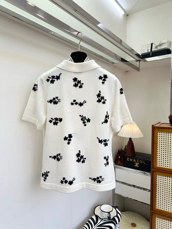 Polo Chanel 2026 en coton noir et blanc à imprimé floral