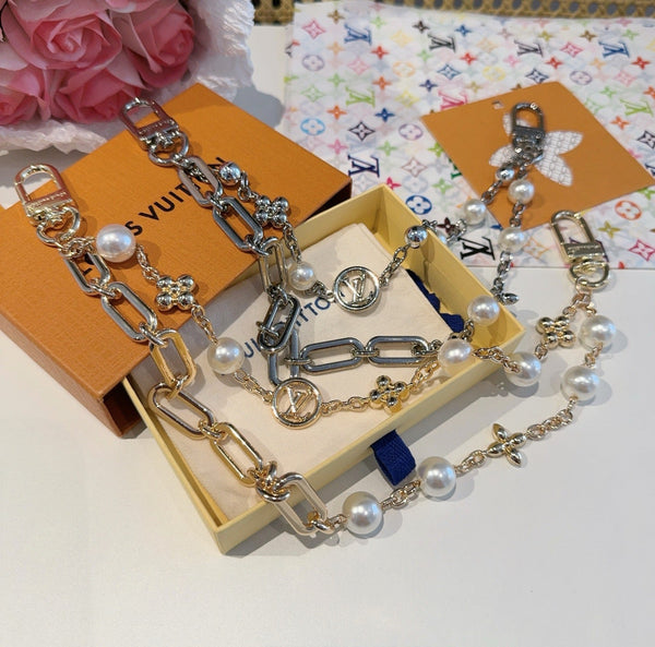 LV Figaro Charm Lustrous Brass