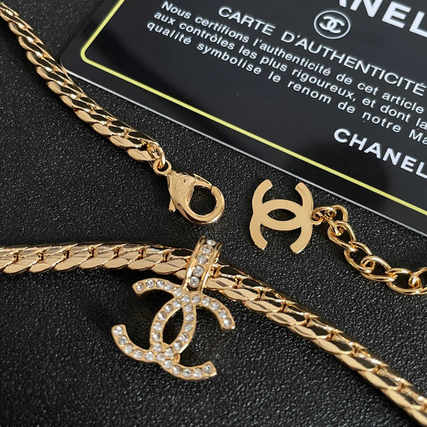 Collier chaîne maille gourmette plaqué or CC avec diamants