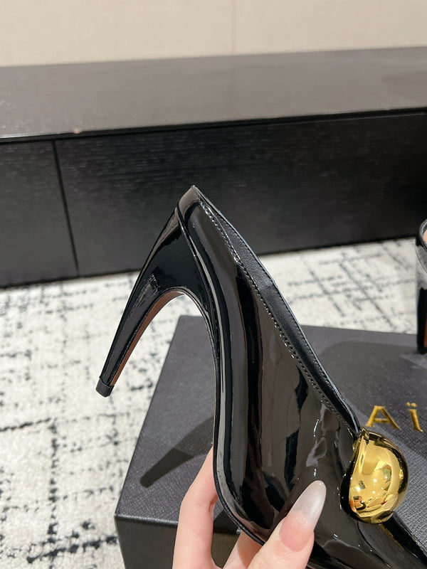 Alaia 25 Azzedine Mules con tacco alto e dettagli dorati Pelle di vitello nera lucida 293188