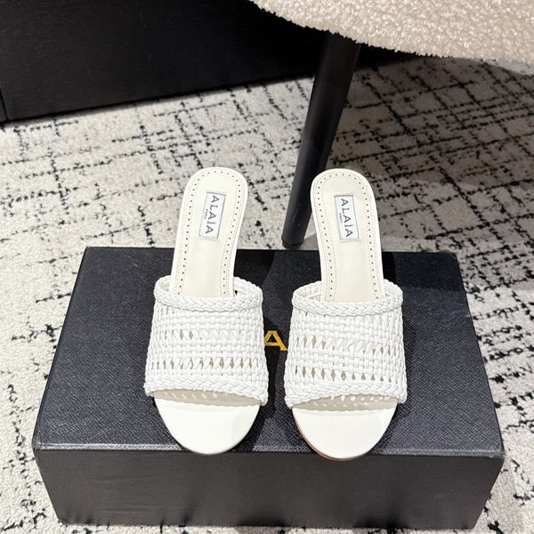 ALAIA Muller décolleté in pelle intrecciata bianca con tacco alto