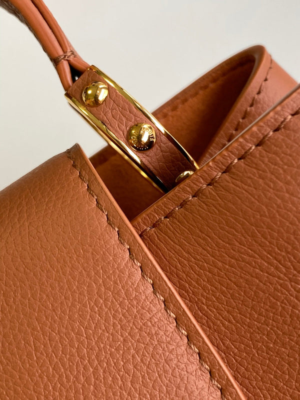 CAPUCINES GM 33CM BROWN GOLD TAURILLON LEATHER 252019