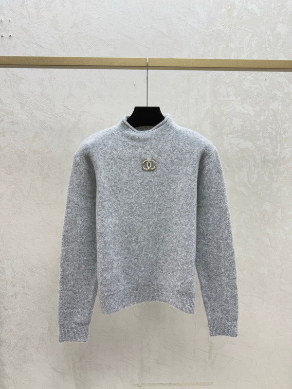 Chandail en tricot Chanel 2025 à col roulé et manches longues en laine et cachemire 734803