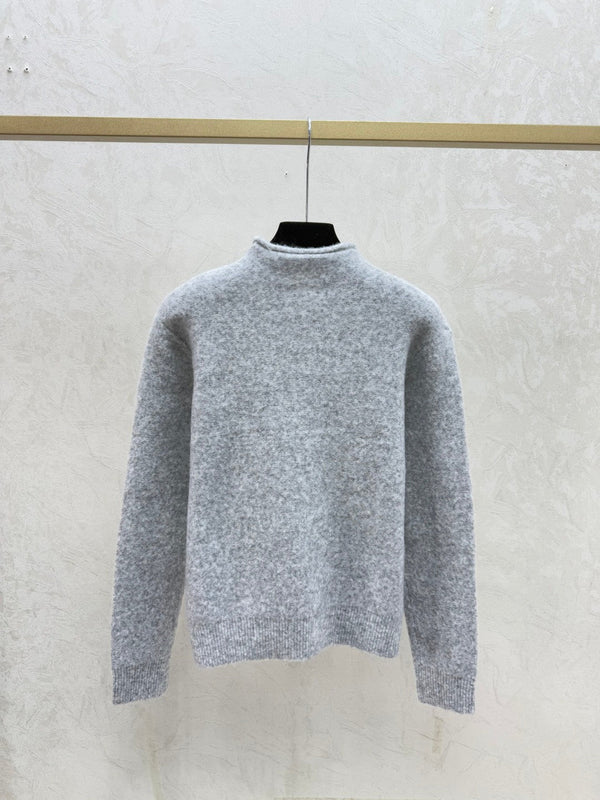 Chandail en tricot Chanel 2025 à col roulé et manches longues en laine et cachemire 734803