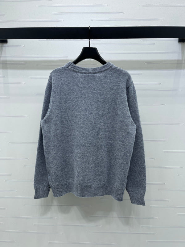 Pull gris à motifs floraux Chanel brodé 340998