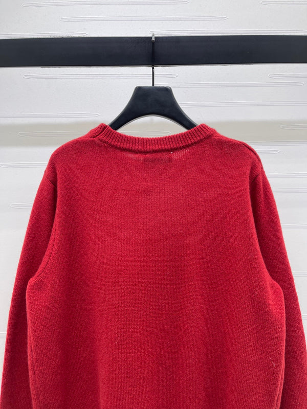 Pull rouge en maille Chanel à motifs floraux brodés 340997
