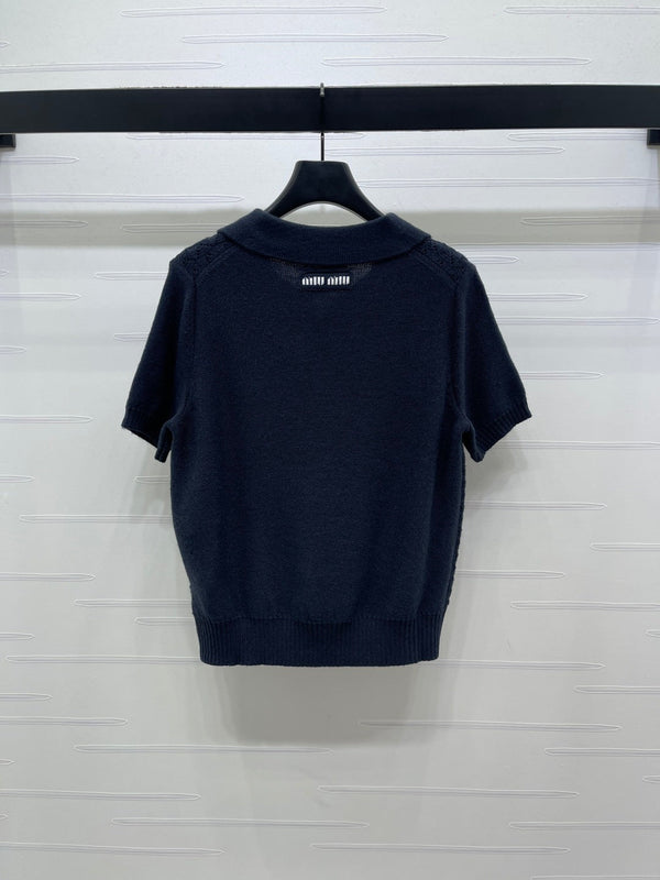 Haut Miu Polo semi-ouvert à manches courtes en maille bleu marine 343436