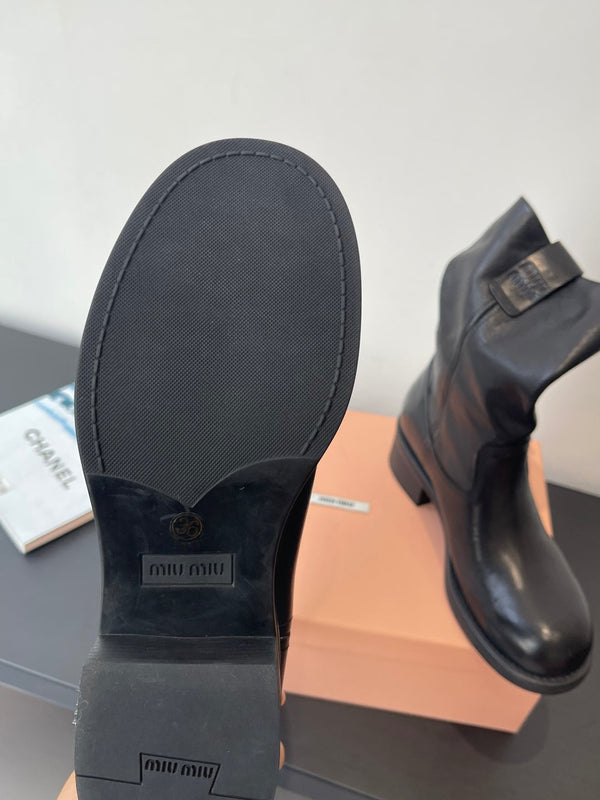 MiuMiu 26 heeled boots black cowhide 521957