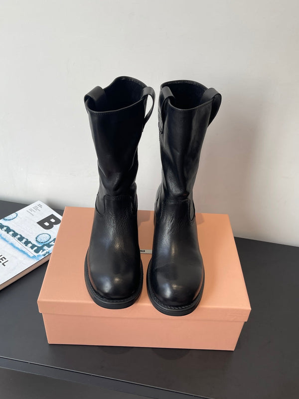 MiuMiu 26 heeled boots black cowhide 521957
