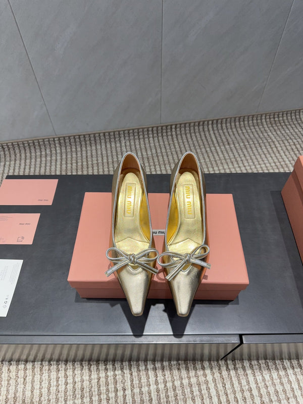 Miu 26s Pointed Toe Pumps 55mm In Gold Calfskin With Bow