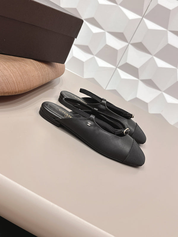 CC 26s Ballerines bout rond à dos ouvert Tissu noir Cuir 613254