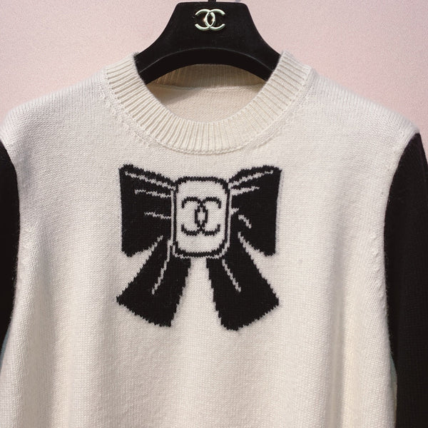 Chanel 25 Pull Nœud Noir Blanc Laine 317422