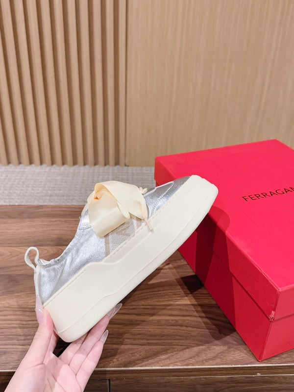 Ferragamo Bow Platform Sneaker Sliver Satin Sheepskin