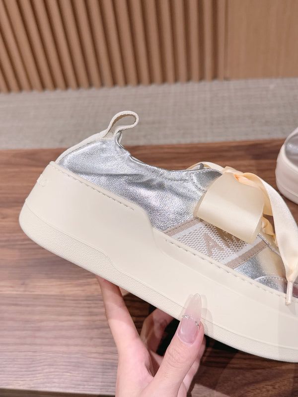 Ferragamo Bow Platform Sneaker Sliver Satin Sheepskin